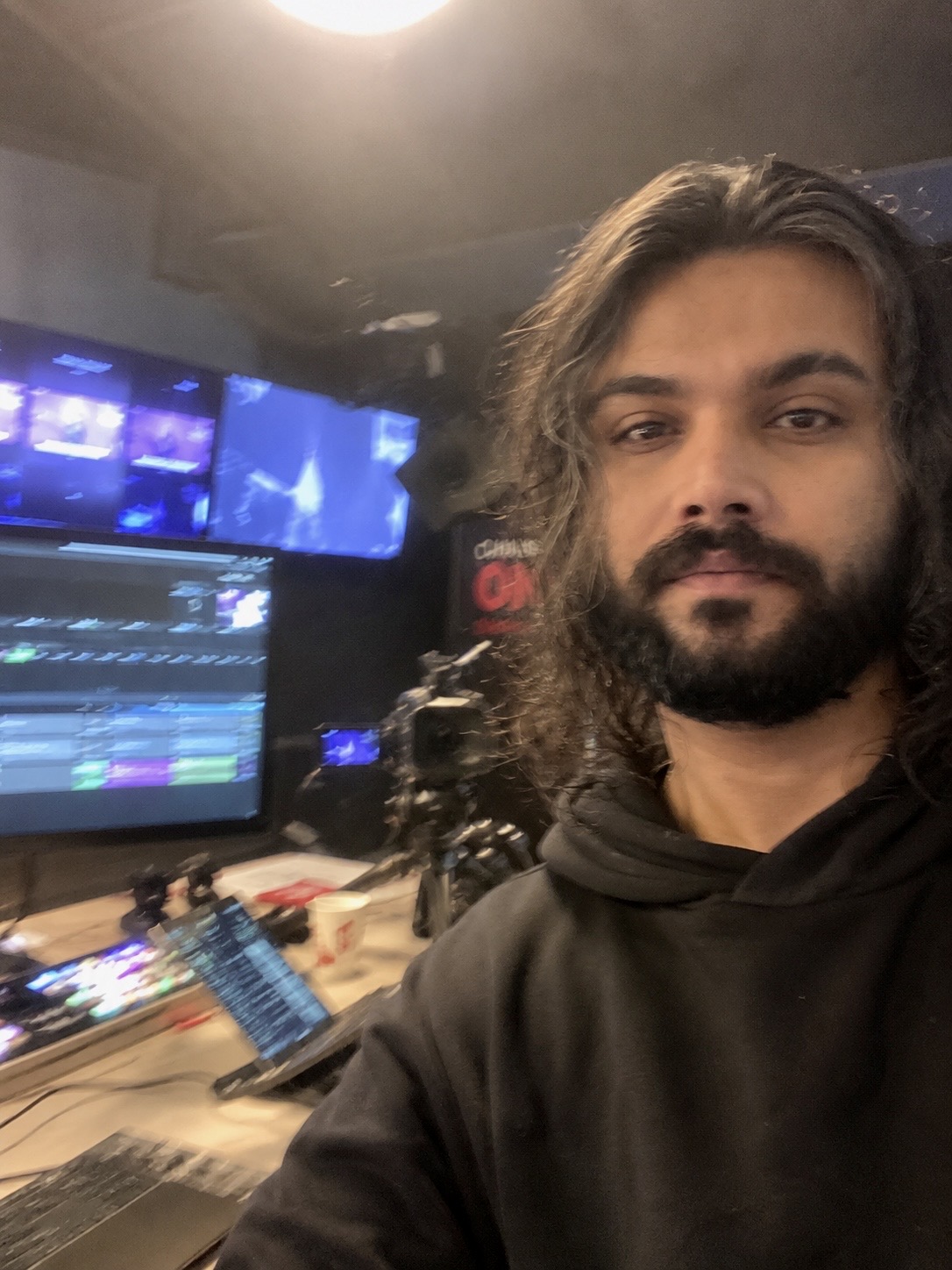 Sam Kazemi in a live television control room